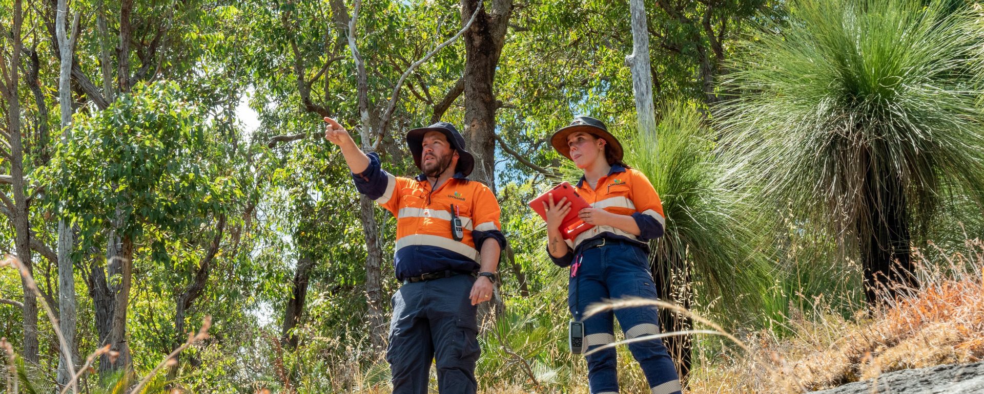 Male and female ecologist completing field surveys in WA