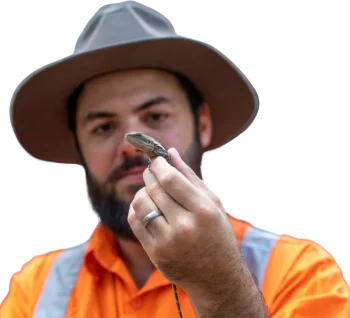 Man holding a lizard