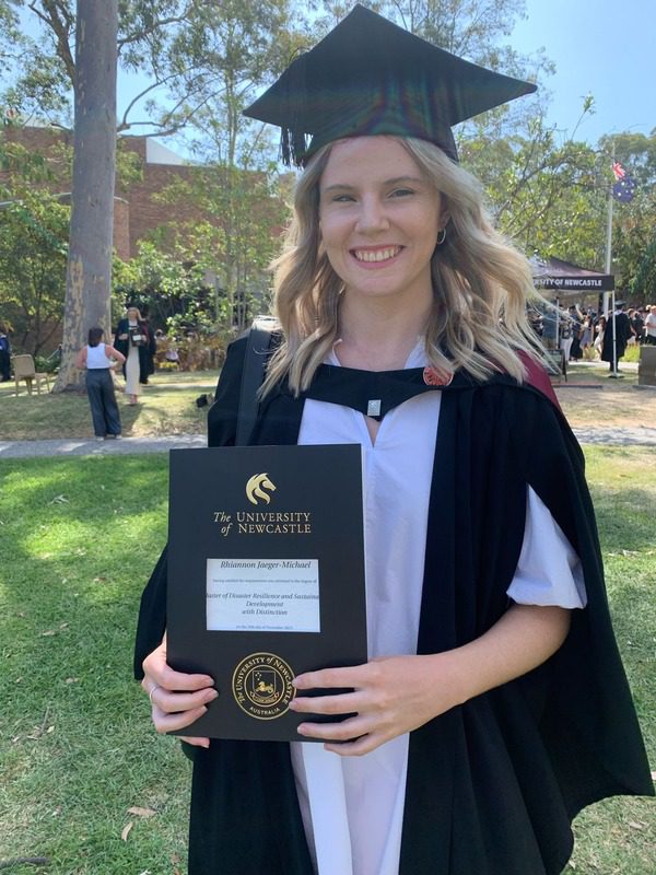 Umwelt Social team member celebrating university graduation from the University of Newcastle