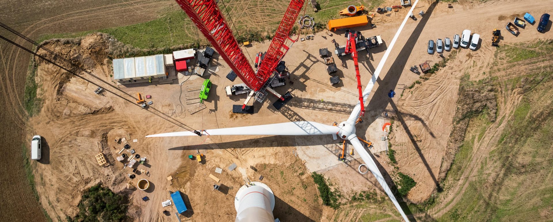 Assembled rotor blades of a wind turbine are seen from high above