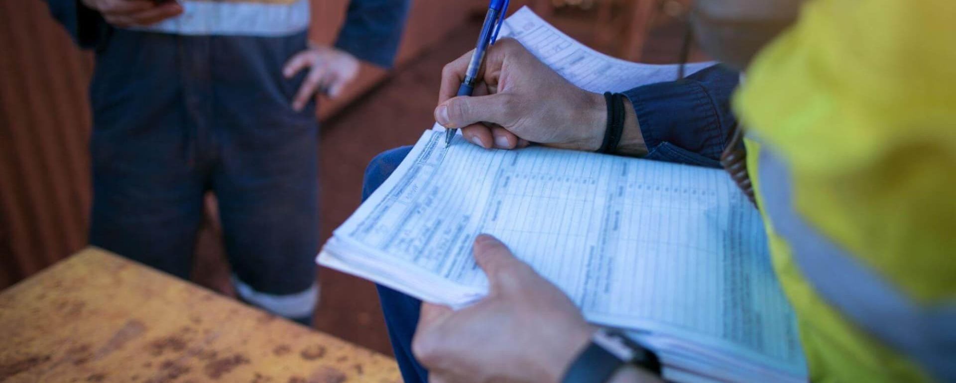 Sustainability & ESG male doing paperwork