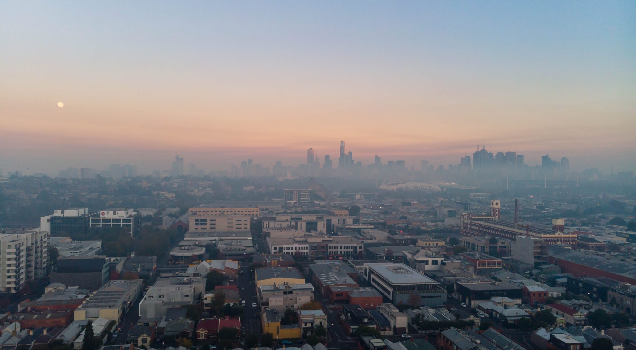 A smoky sunrise in Melbourne city viewed from Richmond.